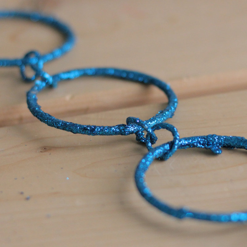 5' x 1.75" Sparkling Glitter Round Circle Chain Artificial Christmas Garland - Unlit, Turquoise Peacock Blue