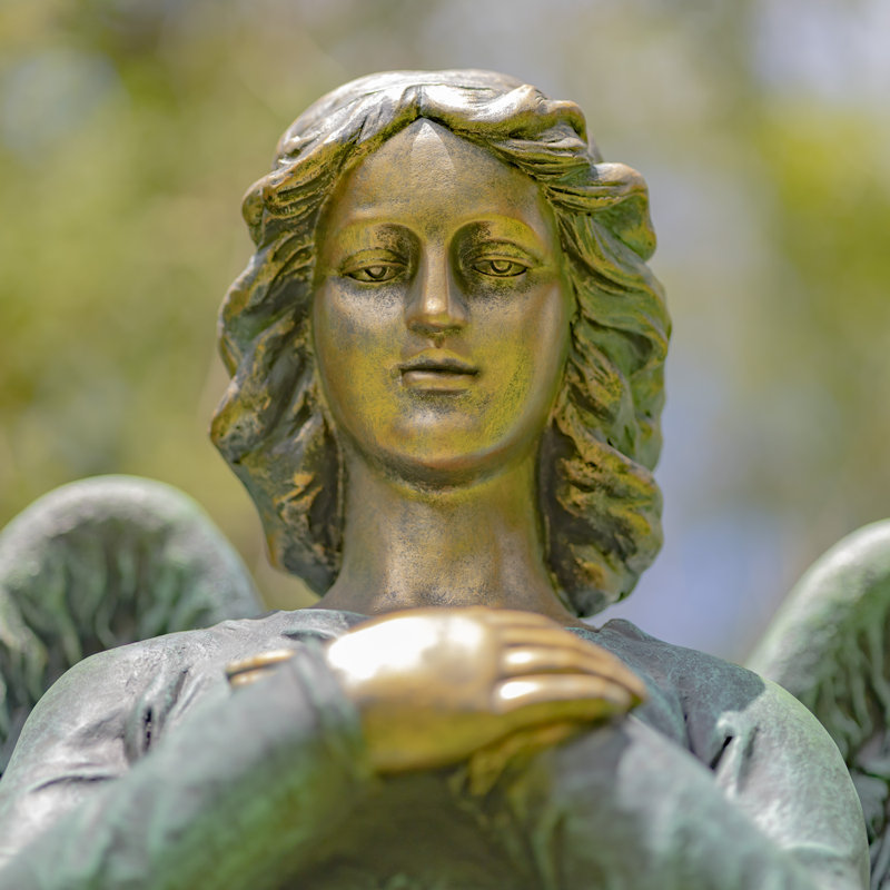 Evangeline Holding Heart Magensium Angel Garden Statue