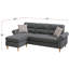 Ensemble de canapé modulaire réversible en polyfibre avec méridienne, coussins moelleux et garniture cloutée élégante pour une assise polyvalente et confortable.