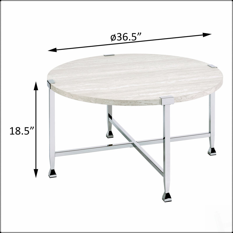 Table basse ronde en chêne blanc et chrome, parfaite pour l'élégance moderne et le charme industriel dans les espaces de vie contemporains.