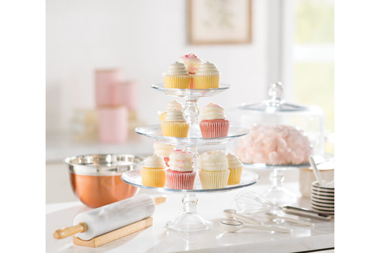 cake stand with pink cakes