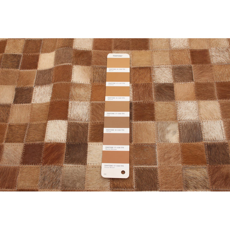Kumail Cowhide Patchwork Indoor Rug