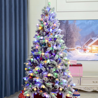 Arbre de Noël floqué avec lumières colorées