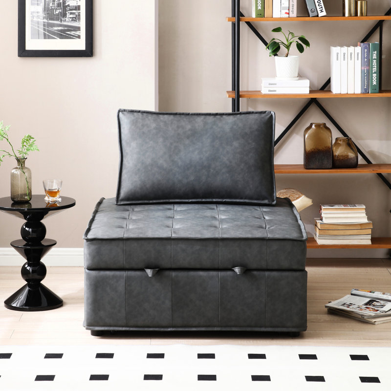 Fauteuil-lit polyvalent gris foncé. Similicuir avec support à ressort. Convertible et fonctionnelle. Amovible pour diverses utilisations. Spécifications: l 39 po x P 42,5 po x H 17,7 po, L 78,3 po x l 35,5 po x H 17,7 po. Supports