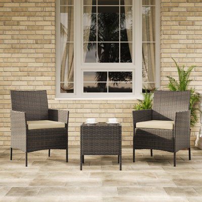 3-Piece Outdoor Rattan Bistro Set with Tempered Glass Table and 2 Cushioned Chairs for Patio, Balcony, or Poolside