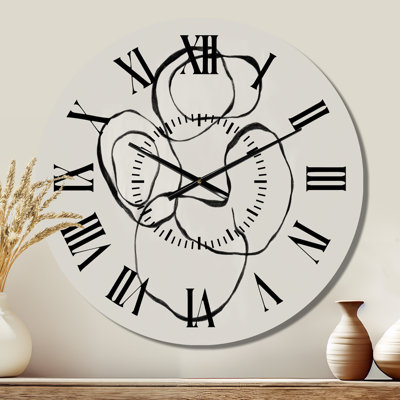 Horloge murale abstraite en métal