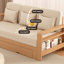 Le canapé-lit entièrement en bois massif est un lit pliant à double usage pour les petits salons et les chambres à coucher.
