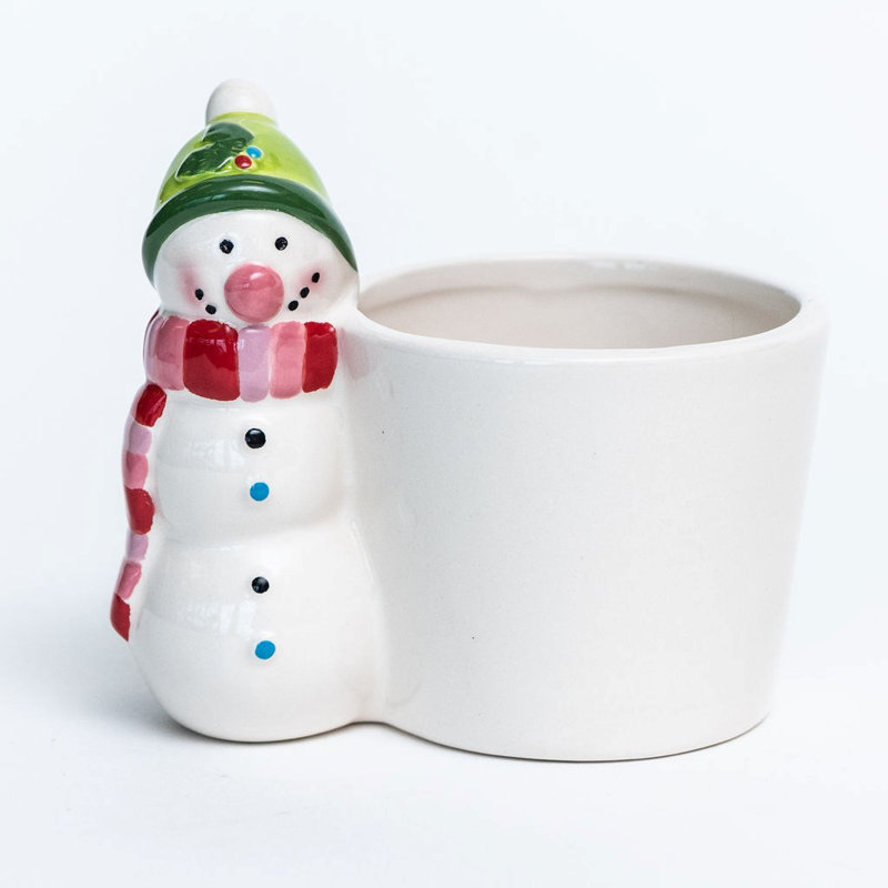 Bonhomme de neige avec pot de fleurs