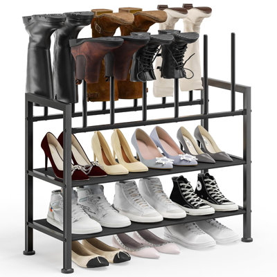 Grandes bottes noires en métal avec rangement pour bottes