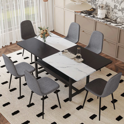 Ensemble de table de salle à manger avec rangement et chaises jumelées, idéal pour les repas de famille et les rassemblements sociaux, alliant style et fonctionnalité.