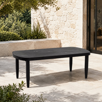 Table basse d'extérieur moderne, plateau en pierre frittée imitation marbre noir, structure en aluminium, fini noir charbon, résistant aux intempéries
