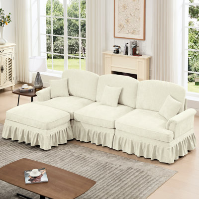 Mid Century Three Seater Sectional Couch With Flared Arms, Movable , And Removable Ruffles, Beige White Chenille Fabric 3 - Modular L Shaped Ruffles Pleats Skirts, Spindle Legs, Comfy