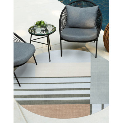 Rezzani Geometric Vinyl Area Rug