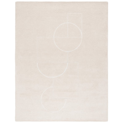 Tapis géométrique beige / ivoire en laine / viscose touffeté à la main Calyssa