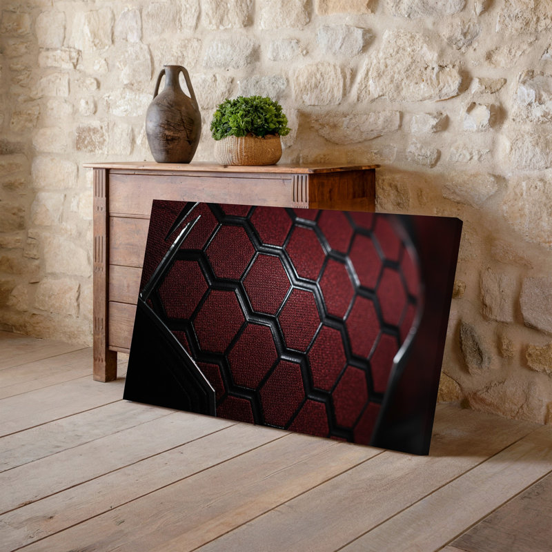 Toile, vue rapprochée d'une surface texturée avec art mural, motif en toile rouge et noir rappelant un super-héros, art mural sur toile