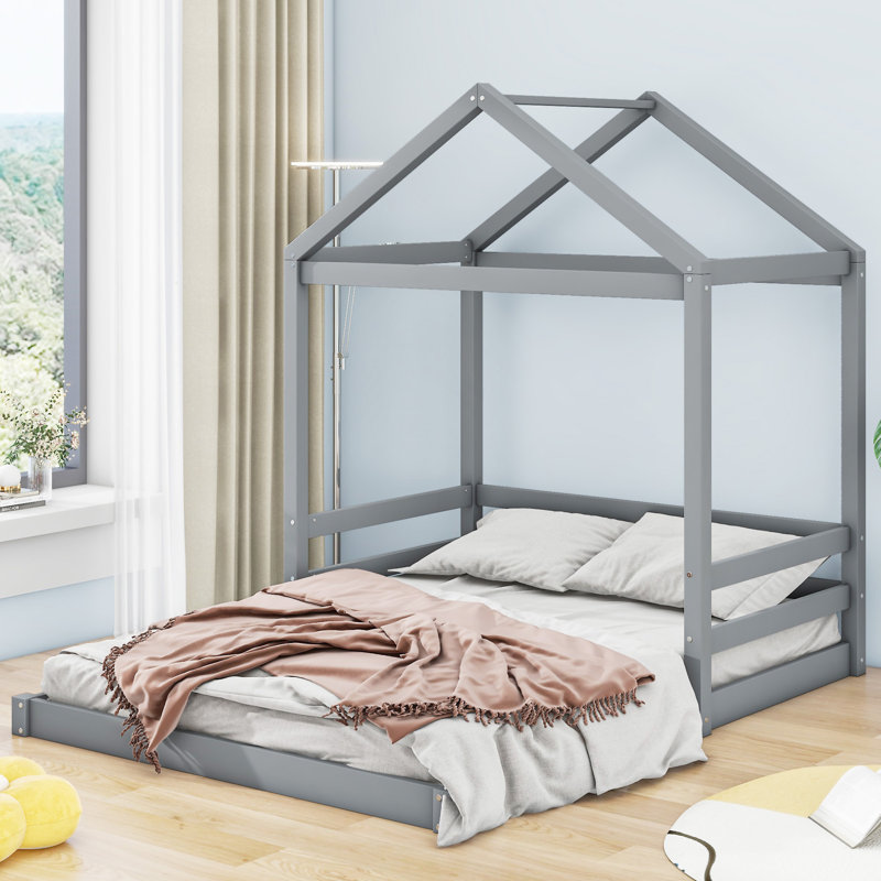 Lit en bois avec garde-corps