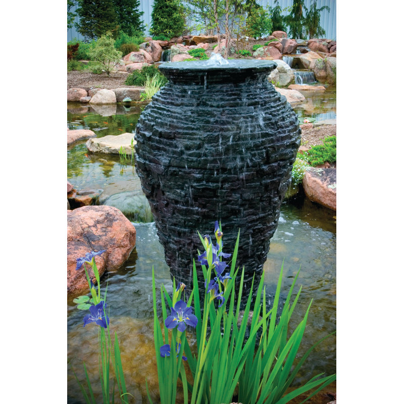 Grande fontaine en plastique / pierre 