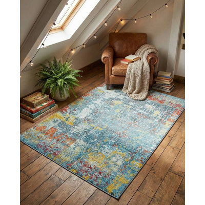 Tapis bleu à motif abstrait Folmar