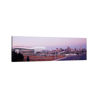 USA, Colorado, Denver, Invesco Stadium, Skyline At Dusk - Wrapped Canvas Panoramic Print