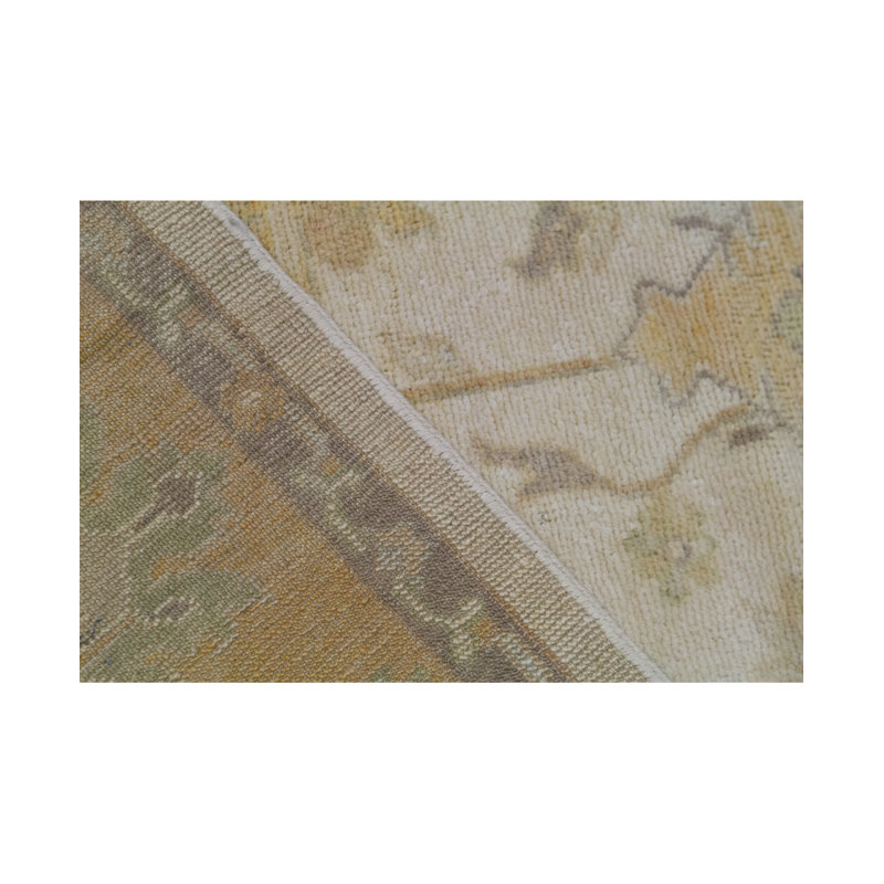Tapis ivoire et doré de haute qualité noué à la main