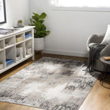 Stuckey Abstract Machine Woven Taupe Area Rug