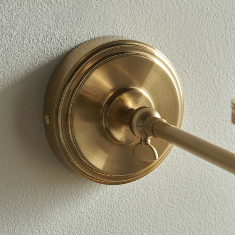 Step Fold Wall Fitting finished in Br Aged Brass