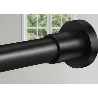 This matte black stainless steel no-drill tension shower rod adjusts from 32-80 inch and needs no tools; its no-slip, no-rust design is intended for bathroom use.