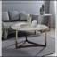 Table basse élégante et durable avec plateau en pierre frittée et finition champagne