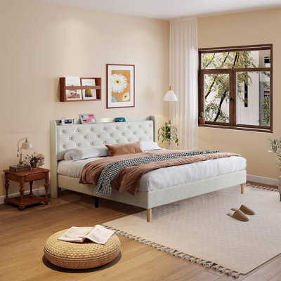 Caitlun Upholstered Wingback Bed