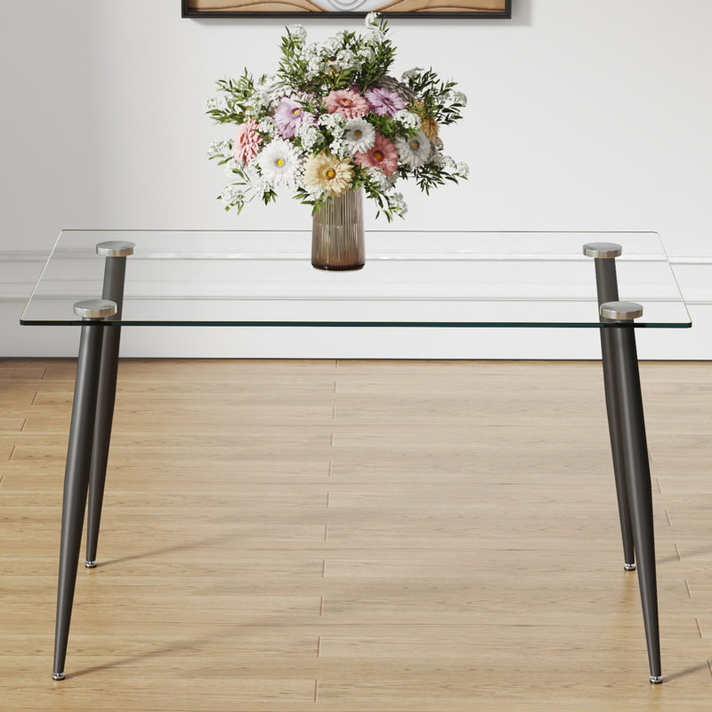 Table moderne en verre avec repose-pieds en métal noir, sièges pour 4 à 6 personnes, facile à nettoyer et à installer, cadre rectangulaire trempé à différents espaces convenable, sièges assises, divers