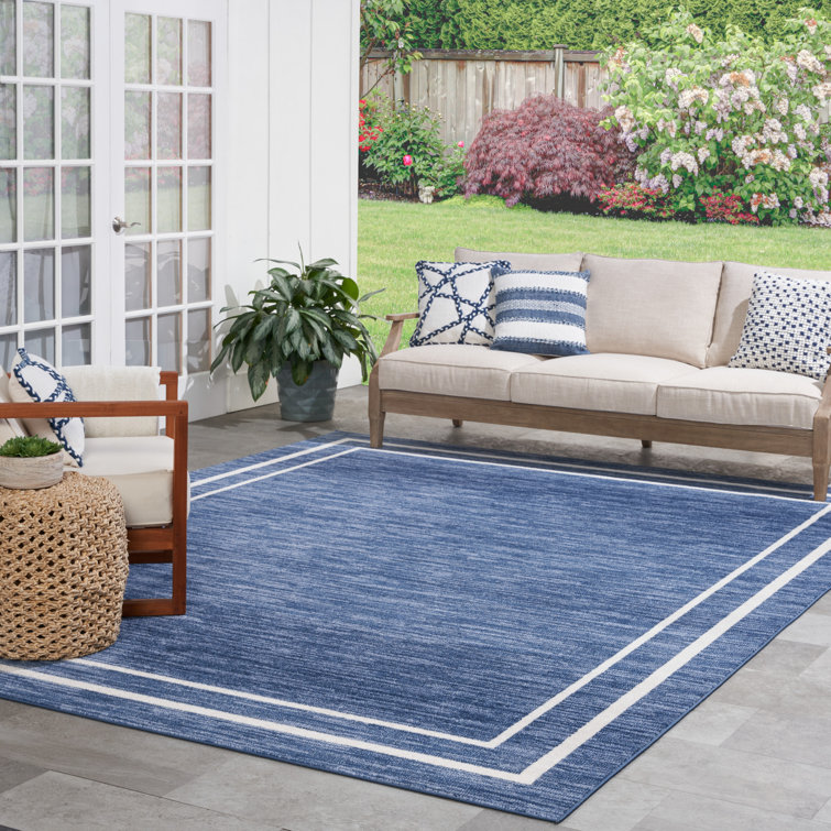 Lucretia Abstract Machine Woven Chenille Indoor/Outdoor Area Rug in Blue