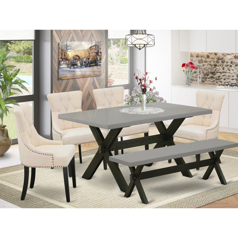 L'ensemble de salle à manger 6 pièces contient une table de salle à manger rectangulaire avec des pieds en X et 4 chaises Parson en tissu de lin beige clair avec un banc, noir brossé