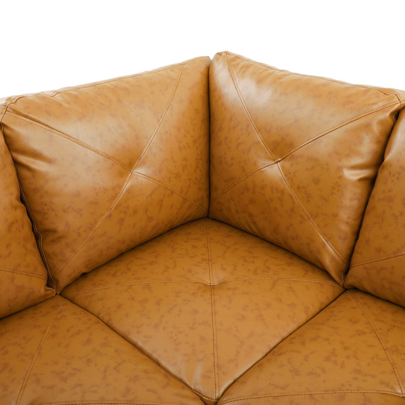 Beverlys 97" Wide Faux Leather Sofa & Chaise with Ottoman, Amber Faux Leather, Right Hand Facing