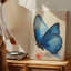 Toile murale avec un grand papillon peint à l'encre de Chine traditionnelle, principalement bleu foncé, de qualité supérieure, prêt à être accroché-606390116