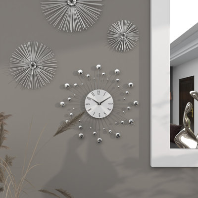 Metal Starburst Wall Clock with Crystal Accents