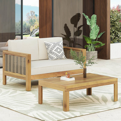Ensemble de causeuse et table basse d'extérieur en bois d'acacia et osier avec coussins, teck et beige