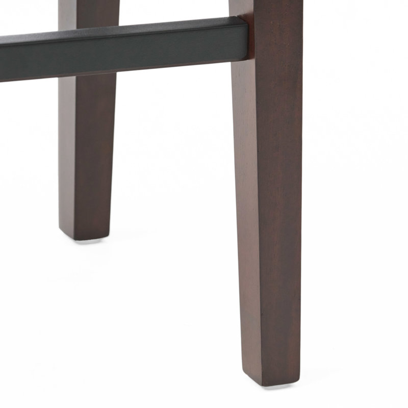 Élégant tabouret en cuir brun chaud en cuir d'hévéa sur un ton profond et confortable en bois d'hévéa