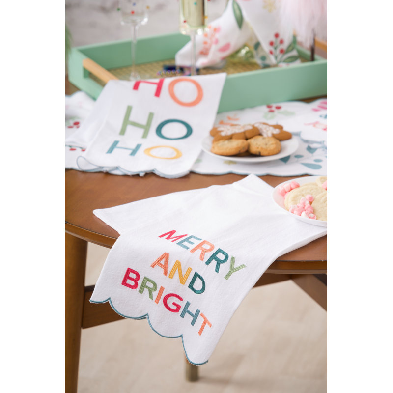 Serviette brodée avec des phrases de Joyeux Noël