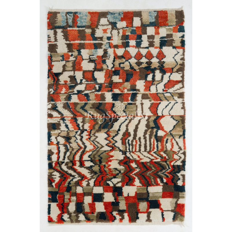 Tapis contemporain en laine avec des poils épais et doux et un motif abstrait