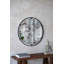 Miroir rond de conception industrielle avec cadre en métal pour le mur et le vestibule