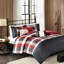 Housse de couette à chevrons avec bordure imprimée et coussins décoratifs aux couleurs chaudes pour le décor de la chambre à coucher-118740127-118740126