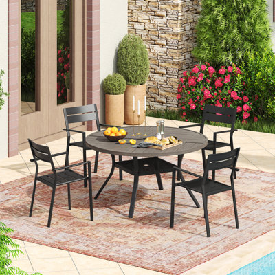 4-Person Round Patio Dining Set with Metal Dining Table and 4 Stackable Metal Armrest Chairs by Lark Manor
