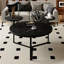 Elegant Coffee Table With Two Display Shelves And Faux Marble Surfaces, Tripod Metal Base, Rounded Tabletop Edges, Black, Classy For Home Decor Modern 2 Shelf Displays, Chic