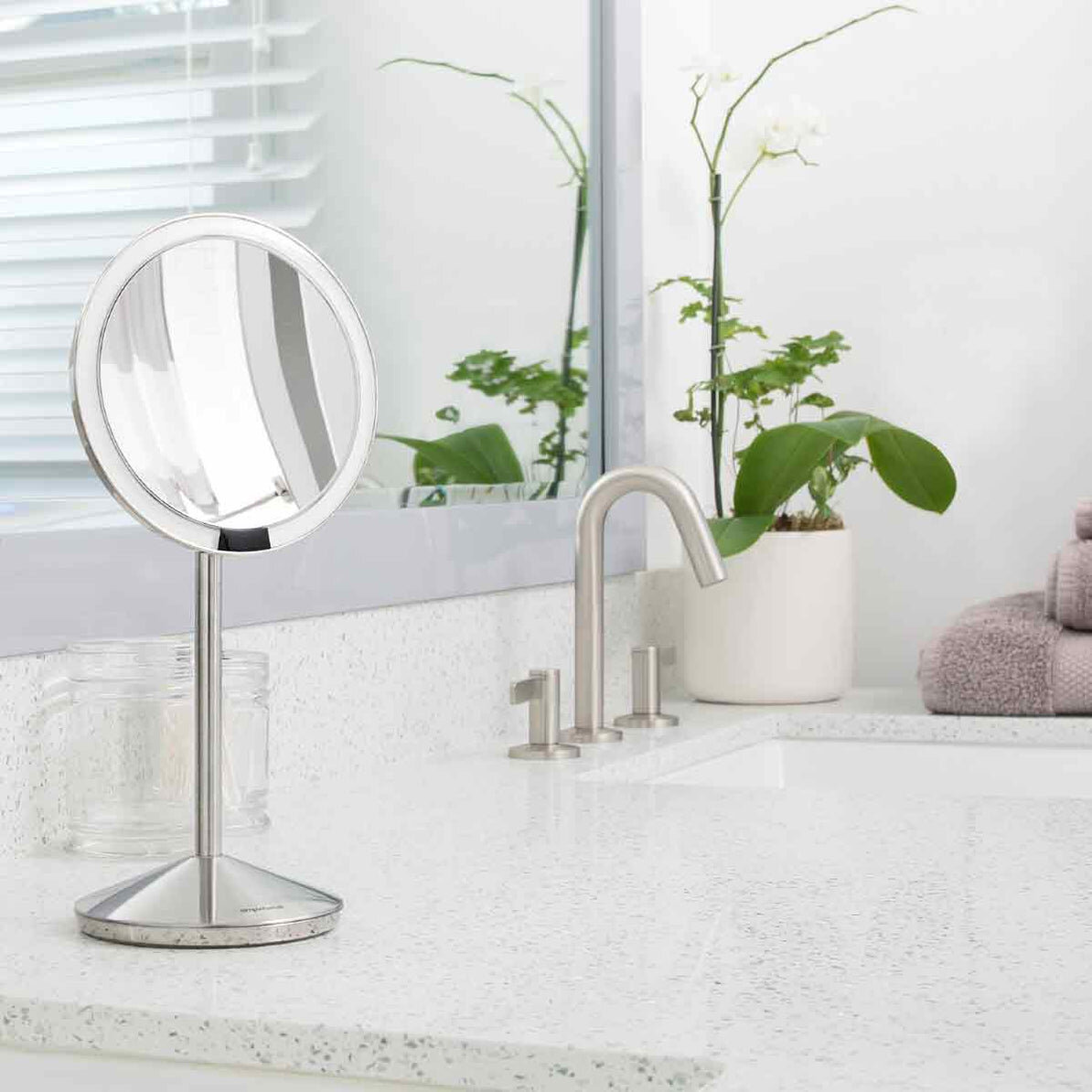 https://assets.wfcdn.com/im/04479096/compr-r85/1936/193695241/simplehuman-5-round-rechargeable-mini-travel-sensor-makeup-mirror-10x-magnification.jpg