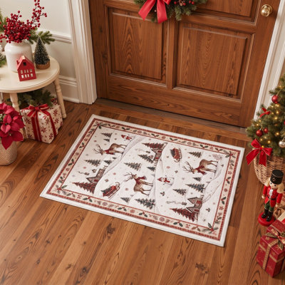 Tapis de salon lavable à poils ras, motif d'animaux de Noël : rennes et village enneigé, ivoire/brun