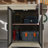 Oak-Finish Garage Work Bench With Mesh Cabinet Door And Adjustable Shelf