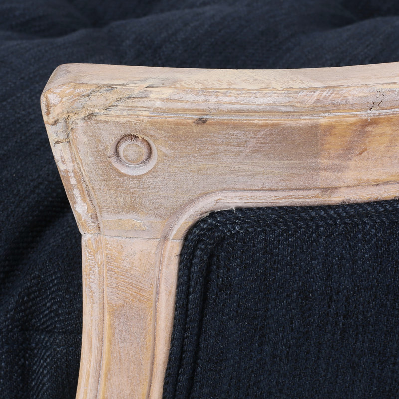 Lit moyen pour animal de compagnie en tissu bleu marine, de style contemporain avec coutures en losange et structure en bois de bouleau