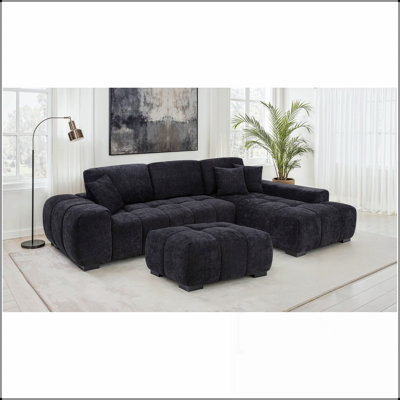 Repose-pieds rectangulaire Plather avec capitonnage profond, parfait pour les espaces de détente modernes.