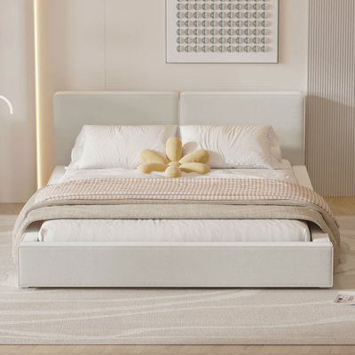 Grand lit plateforme tapissier avec tissu en velours