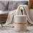 Celynn 14" Wide Velvet Round Ottoman with Gold Accent-1027459089